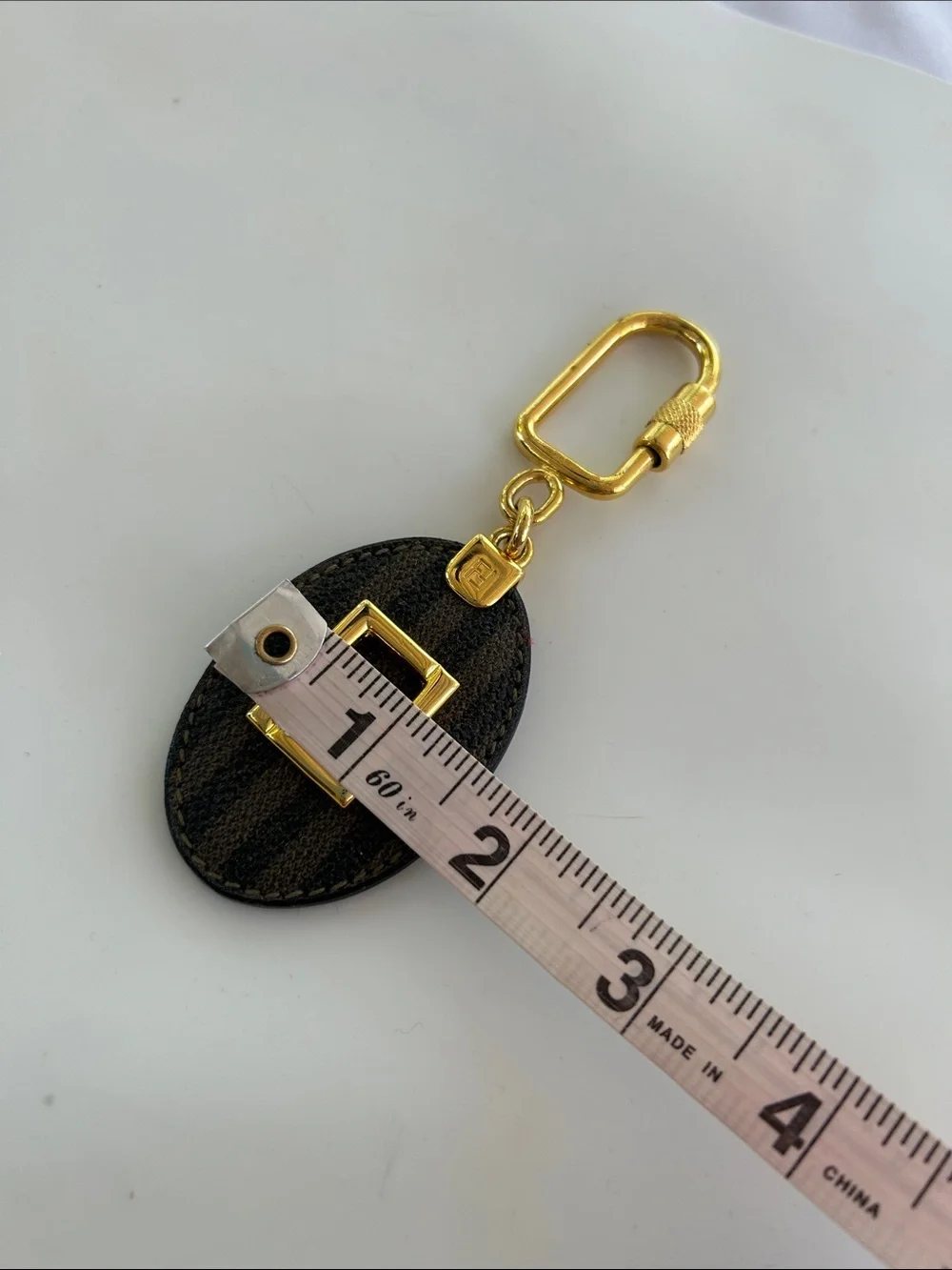Authentic FENDI Vintage Zucca Monogram Oval Keychain / Bag Charm - Gold Hardware